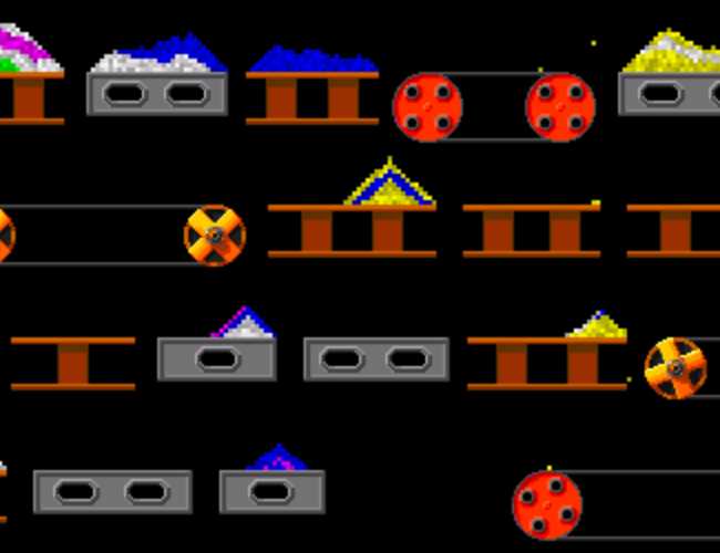 A series of conveyor belts and scaffold-like platforms, some of which are covered in piles of colorful particles.