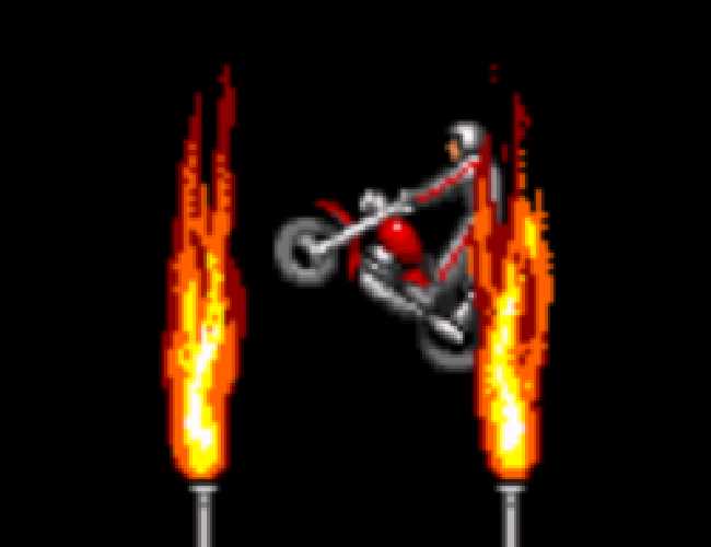 A small sprite of a man in a jumpsuit and helmet on a motor cycle jumping across a pair of flaming torches.